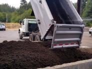 Dumptruck from the Wastewater Treatment Plant dumping biosolids 