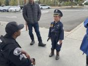 Police Officer engaging with youth in the community