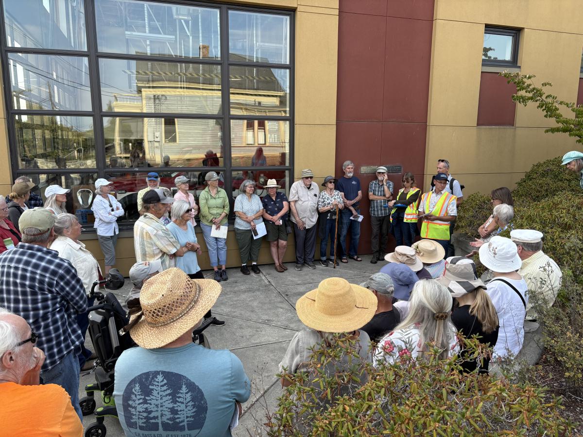 Group of people engaging in the Lawrence Street Walk-Through August 2025